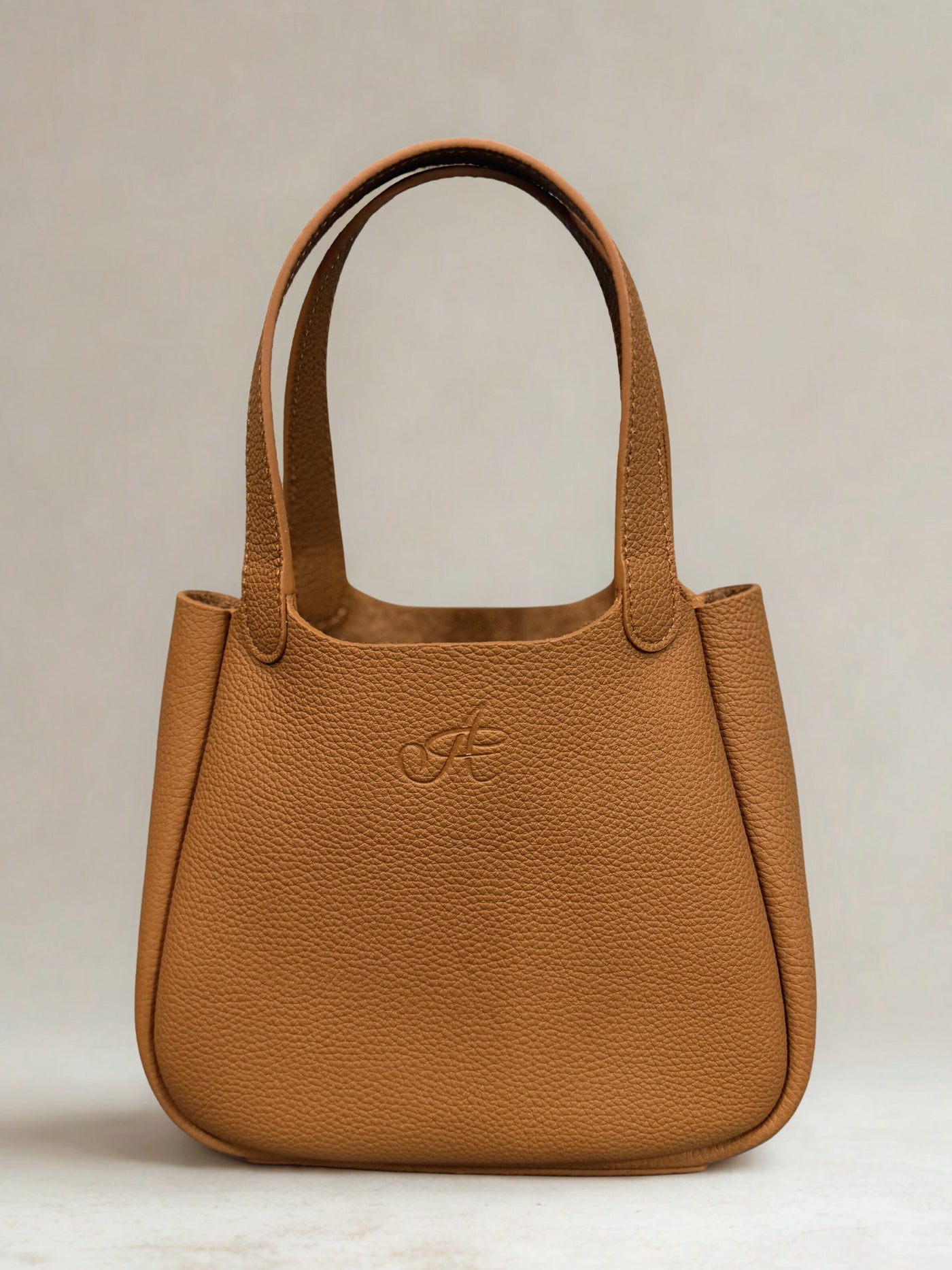 Alyaah handbag carried in an editorial lifestyle scene